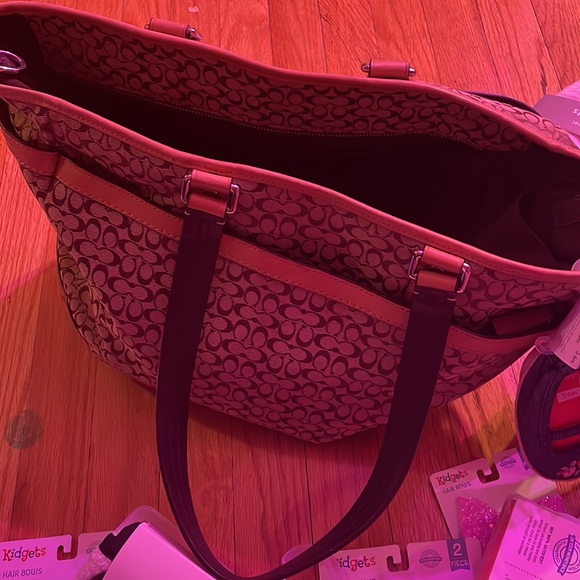 Coach diaper bag filled with goodies - Picture 14 of 16